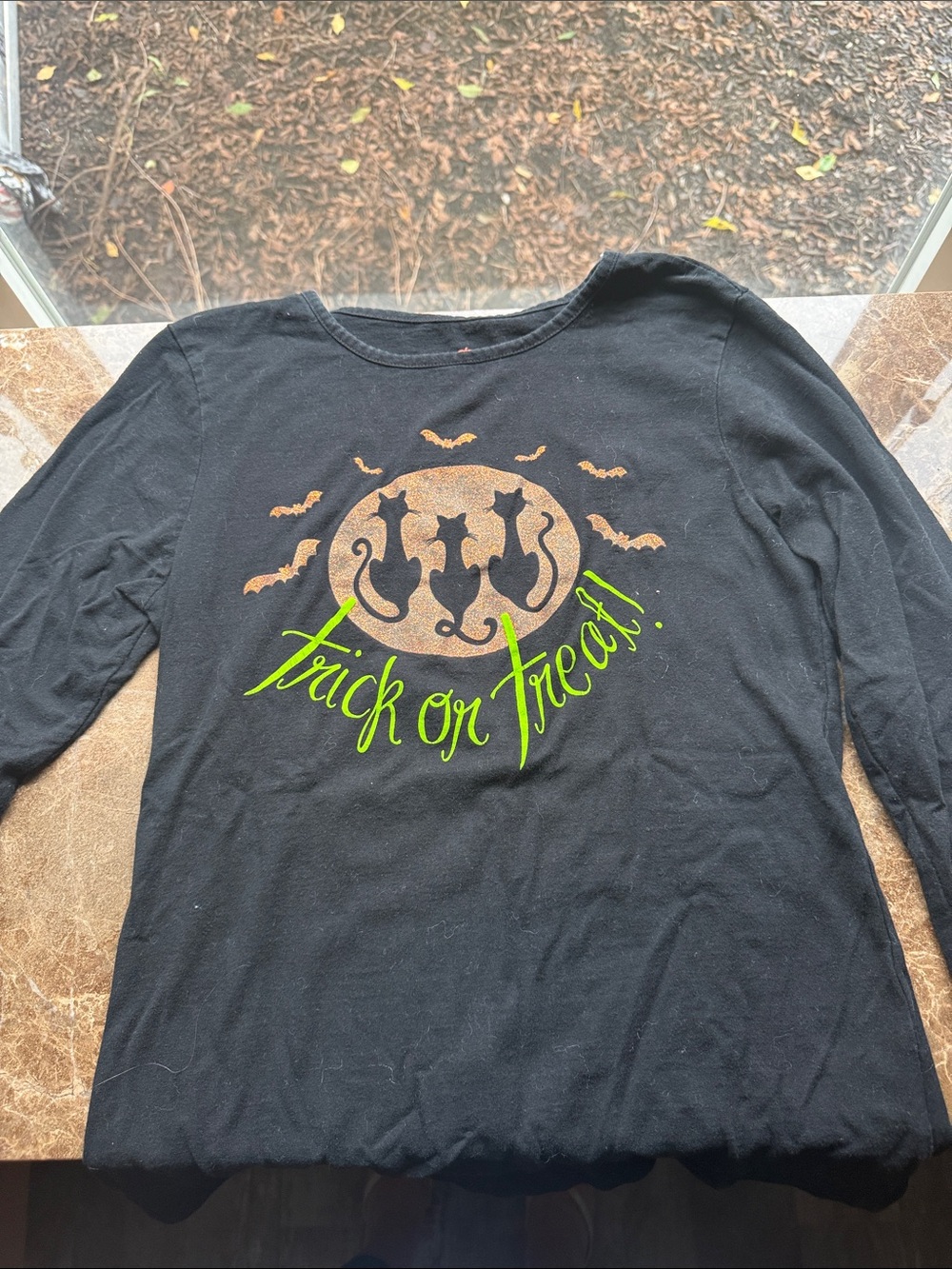 Disney Black Long Sleeve "Trick or Treat" Tee with Orange Moon and Green Script